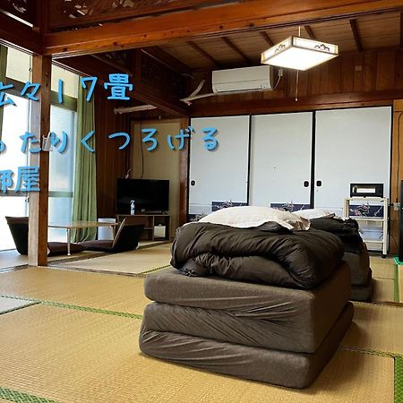 民泊まったりん人 Apartment Kumejima Bagian luar foto